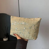 Armbånd i rattan og strå