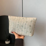 Armbånd i rattan og strå