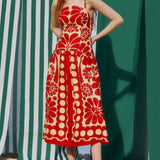 Charmerende rød ærmeløs rygløs midikjole