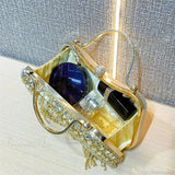 Sølvfarvet skuldertaske med glitrende kvaster og rhinsten