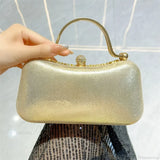 Sølvfarvet skuldertaske med glitrende kvaster og rhinsten