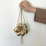 Rosaguld akryl clutch med blomstermønster