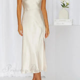 Satinkjole med kavalerudskæring og snoet slids bagpå