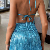 Rygløs jumpsuit med satinfrynser