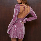 Bodycon minikjole med pailletter, åben ryg og lange ærmer