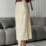 Højtaljet midi-nederdel med pailletter