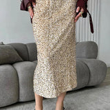 Højtaljet midi-nederdel med pailletter