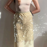 Pailletbesat midinederdel med farveblokke