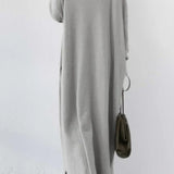 Sweatshirtkjole med slids forneden og V-hals