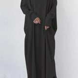 Sweatshirtkjole med slids forneden og V-hals