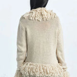 Lang, løstsiddende cardigan med frynser i ensfarvet strik