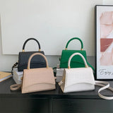 Designer skuldertaske i almindeligt PU-læder