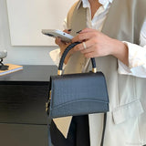 Designer skuldertaske i almindeligt PU-læder