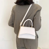 Designer skuldertaske i almindeligt PU-læder