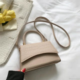 Designer skuldertaske i almindeligt PU-læder