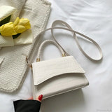 Designer skuldertaske i almindeligt PU-læder