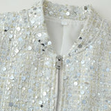 Paillettejakke med høj krave og lange ærmer