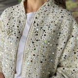 Paillettejakke med høj krave og lange ærmer