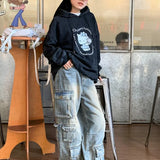 Patchwork-denim cargobukser med lommer i streetwear-stil