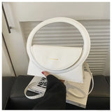 Luksuriøs skuldertaske i læder med rundt håndtag fra et eksklusivt mærke