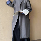 Trenchcoat med brede revers, løstsiddende overfrakke