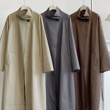 Trenchcoat med brede revers, løstsiddende overfrakke