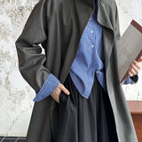 Trenchcoat med brede revers, løstsiddende overfrakke