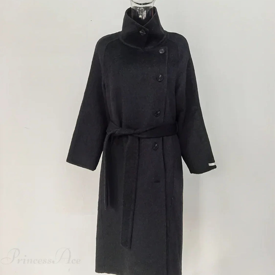 Uldfrakke med rullekrave og enkeltradede knapper