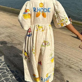 Unik midikjole med blomsterprint og pufærmer, folkestil, ideel til fester