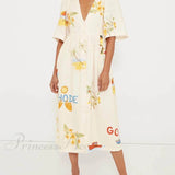 Unik midikjole med blomsterprint og pufærmer, folkestil, ideel til fester