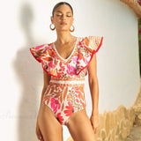 Todelt sæt med en nederdel med retroprint og V-hals