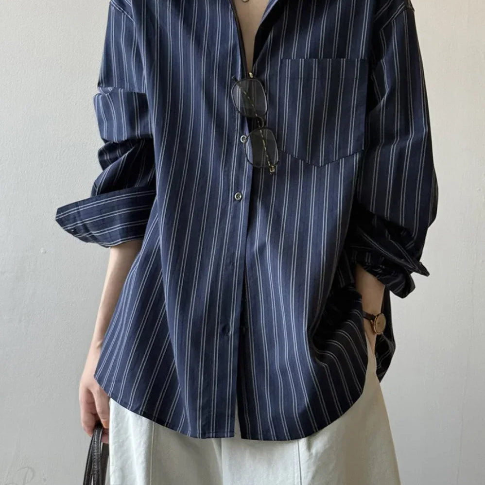 Løstsiddende bomuldsbluse med lodrette striber og lange ærmer