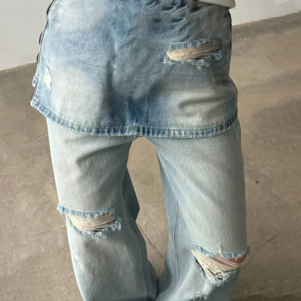 Højtaljede, asymmetriske jeans med vide ben i vasket denim